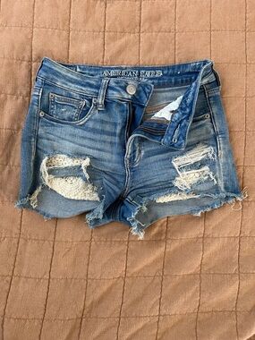American Eagle Outfitters Distressed Lace-Back Denim Shorts - Blue